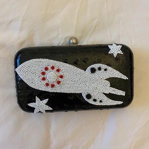 Beaded abs Ostrich clutch